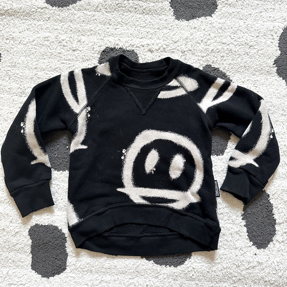 Sweatshirt top with face pattern